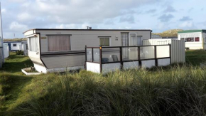 AMELAND-Nes-Duinoord: Stacaravan (chalet) + fietsen direct aan zee!